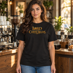 Lord of the Coffee Beans tee worn by a barista in a café