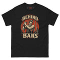 Behind Bars tee, black, front: vintage illustration of a bartender in sunglasses shaking a cocktail behind jail bars on a red circle, distressed cream BEHIND BARS lettering