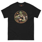 Dead on My Feet Barista tee, black, front: illustration of a grinning zombie barista in a leather apron pouring latte art, framed by a copper circle with an espresso machine, grinder and jars of coffee beans