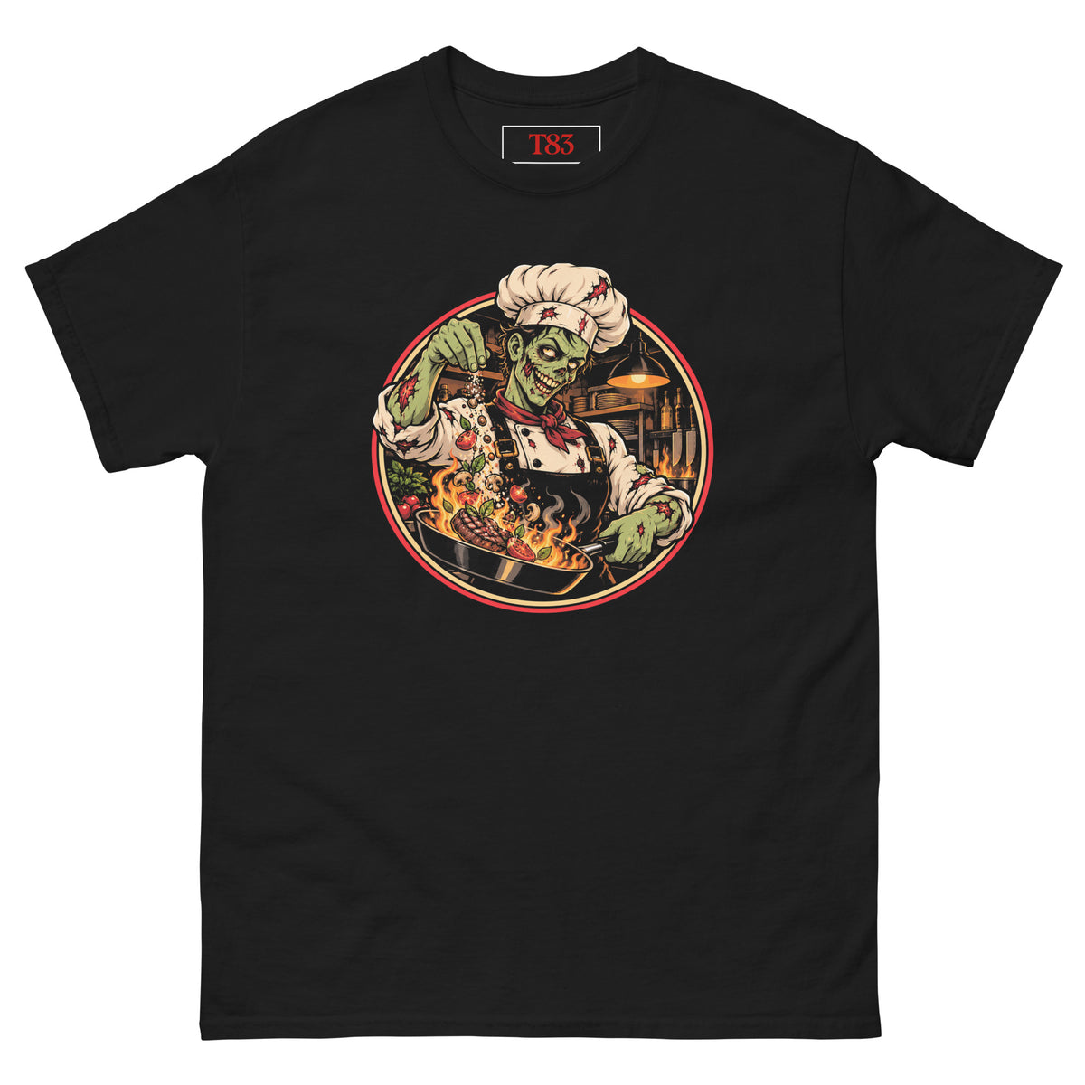 Dead on My Feet Chef tee, black, front: illustration of a grinning zombie chef in a toque and red neckerchief seasoning a flaming pan with steak and tomatoes, framed by a red and cream circle with a kitchen behind