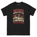 I Improve with Wine tee, black, front: WINE IMPROVES WITH AGE. I IMPROVE WITH WINE. in burgundy and cream lettering around an illustration of a man in sunglasses raising a glass of red wine, with vines, grapes and a bottle