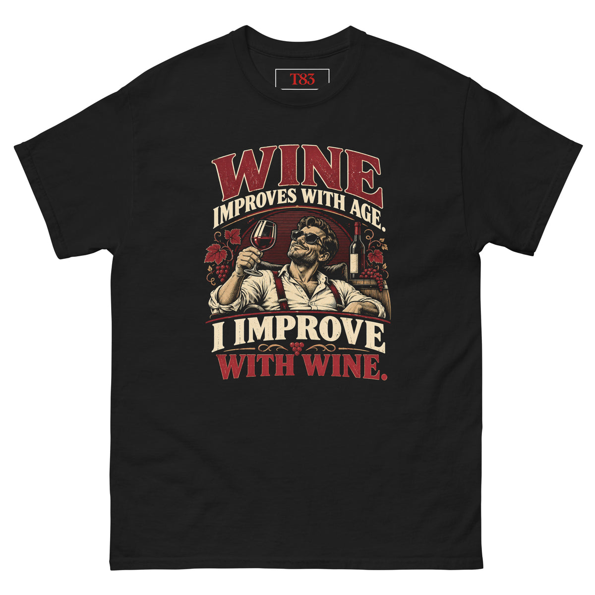 I Improve with Wine tee, black, front: WINE IMPROVES WITH AGE. I IMPROVE WITH WINE. in burgundy and cream lettering around an illustration of a man in sunglasses raising a glass of red wine, with vines, grapes and a bottle