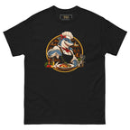 Kitchen Shark (Her) tee, black, front: illustration of a grinning shark chef in a toque, red polka-dot bandana and red neckerchief seasoning a plate of grilled salmon, framed by a gold circle with copper pans behind
