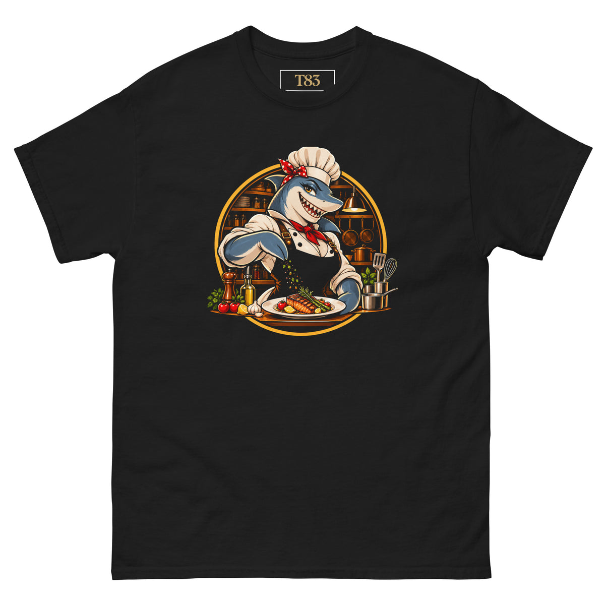 Kitchen Shark (Her) tee, black, front: illustration of a grinning shark chef in a toque, red polka-dot bandana and red neckerchief seasoning a plate of grilled salmon, framed by a gold circle with copper pans behind